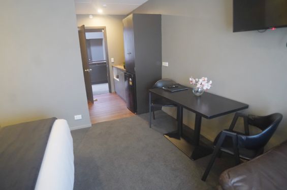 Queen Studio lounge and kitchenette